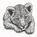 lion cub laying horizontally tattoo design idea