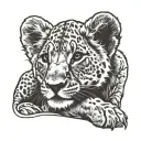 lion cub laying horizontally tattoo design idea