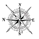 simple compass cross with arrow pointing North with small lotus flower in bottom right hand corner tattoo design idea