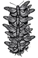 a cluster of moths starting at the elbow wrapping around the arm, the moths are traveling towards the wrist with the clu tattoo design idea