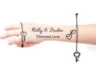 "Kelly & Dustin - Eternal Love" stacked bracelet on wrist including heart & key & infinity symbol  tattoo design idea