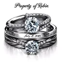 "Property of Robin" name with wedding rings and date tattoo design idea