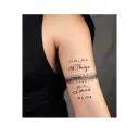 arm band with my kids names, Thiago(08/19/2010) and Lucia(03/31/2025) and their birth dates tattoo design idea