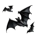 A few bats flying tattoo design idea