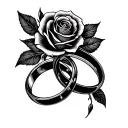 A tattoo design featuring intertwined wedding rings and elegant roses tattoo design idea