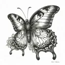 A butterfly but one side made with the letter E and the other side made with the letterB tattoo design idea