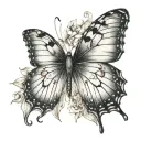 A butterfly but one side made with the letter E and the other side made with the letterB tattoo design idea
