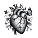A realistic anatomical heart with vessels and chambers maybe with flowers or butterflies or  tattoo design idea