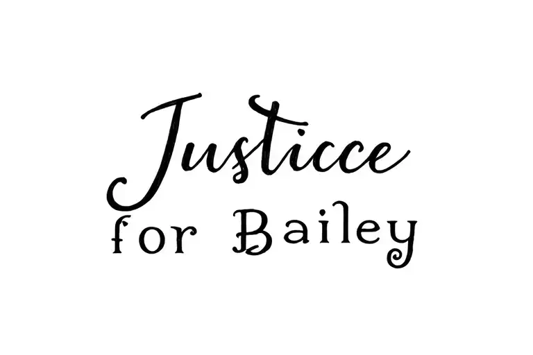 small cursive back tattoo saying justice for Bailey tattoo design idea