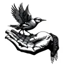 A delicate bird returning to an open hand reaching tattoo design idea