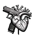 anatomical heart intertwined with glock 17 tattoo design idea