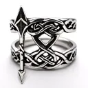 celtic knot ring with a celtic style arrow in the cender of the ring. tattoo design idea