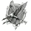 mockingjay infront tattoo design idea