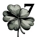 4 leaf clover and number 7 tattoo design idea