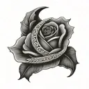 black-and-gray design featuring a horseshoe with a rose in the center. The horseshoe is positioned in a "U" shape, symbo tattoo design idea