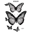 Got it! So you want:	•	Six butterflies flying toward the Roman numerals for 1971 (MCMLXXI)	•	The butterflies to start  tattoo design idea