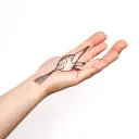 A delicate bird returning to an open hand reaching tattoo design idea