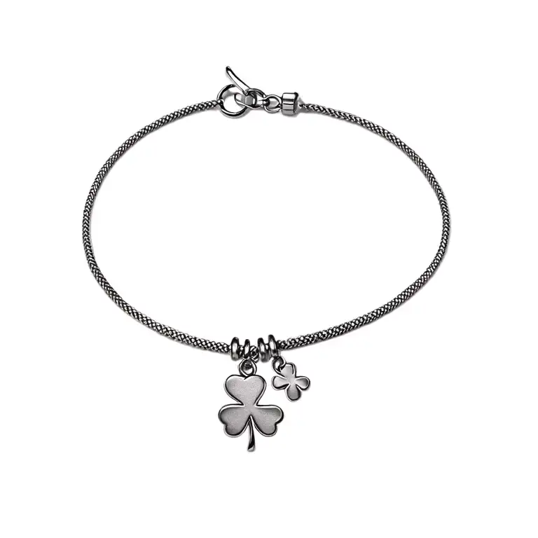 charm bracelet with shamrock charm tattoo design idea