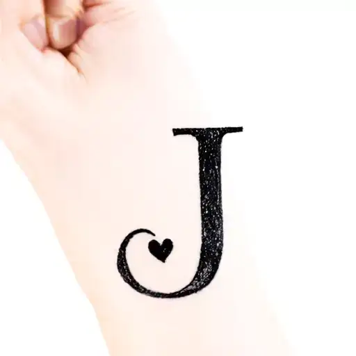 "small and elegant, minimal" lowercase J with heart tattoo design idea