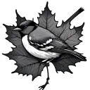 maple leaf wrapped around a mockingbird dainty tattoo design idea