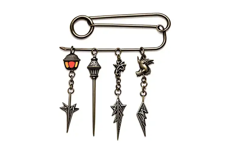 Closed safety pin with dangling charms: apple, lamppost, dragon, ghost, lightning rod, arrow tattoo design idea