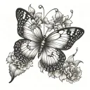 Butterfly tattoo, one wing of the butterfly is just an outline, and the second is in the form of a breeze of bush flowers tattoo design idea