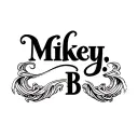 "Mikey B." "Mikey B." fancy chicano style tattoo with fancy swirly lines around name tattoo design idea