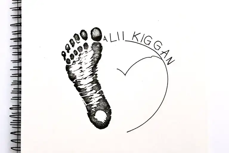 "Ali Kagan" baby footprint and mother tattoo design idea