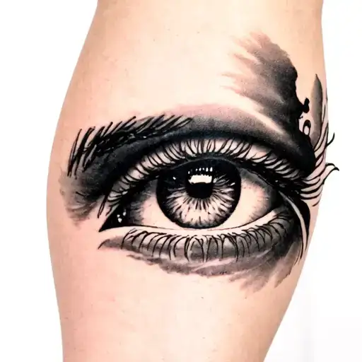 forearm tattoo with realistic eye and woman tattoo design idea