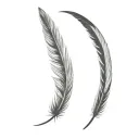 raven feathers falling tattoo design idea
