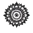 A circular tattoo that can be interpreted as either a flower, a star, or an eye tattoo design idea