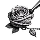 A ball of yarn with a single strand coming from the yarn to a crochet hook that acts as the stem of a rose tattoo design idea