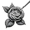 A ball of yarn with a single strand coming from the yarn to a crochet hook that acts as the stem of a rose tattoo design idea