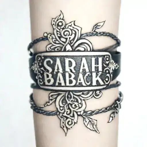 a bracelet on my wrist that says Sarah tattoo design idea
