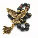 omerta calligraphy orthodox eagle prayer beads tattoo design idea