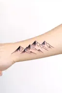 Mountains on the arm tattoo design idea