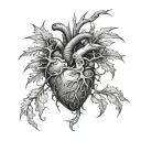 gothick anatomical heart with thorns vine wrapped tattoo design idea