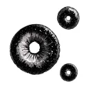 Two Seeds in the shape of a Semicolon, one circle shaped seed and the other a comma. black and white tattoo design idea