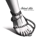 dainty unique chain link wrapping around ankle to a elegant bold cross chain tattoo design idea