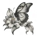 half of butterfly and half flowers iris,violette and poinsettia tattoo design idea