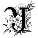 Create a tattoo design featuring an elegant, bold cursive letter ‘J’ intertwined with detailed daffodil flowers tattoo design idea