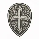 cross inside shield engraved tattoo design idea