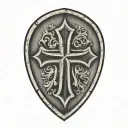 cross inside shield engraved tattoo design idea