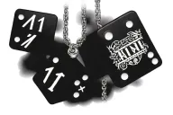 Roman numerals 11 11 with dice hanging from it tattoo design idea
