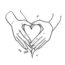 hands molding clay into a heart shape tattoo design idea