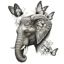 elephant n butterfly wing for ears surrounded tattoo design idea