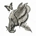elephant n butterfly wing for ears surrounded tattoo design idea