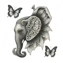elephant n butterfly wing for ears surrounded tattoo design idea