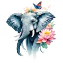 Elephant head with trunk up with butterfly at top of trunk surrounded with lotus flowers tattoo design idea