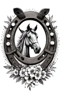A dotwork tattoo of a horseshoe surrounded by spurs and delicate floral elements tattoo design idea